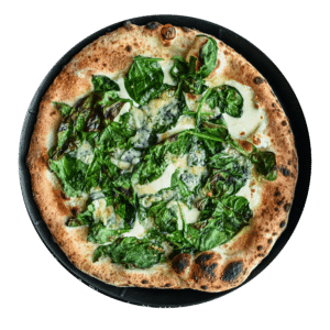The Iron Mike pizza has fresh mozzarella, baby spinach, caramelized garlic, hand shaved parmesan, extra virgin olive oil.